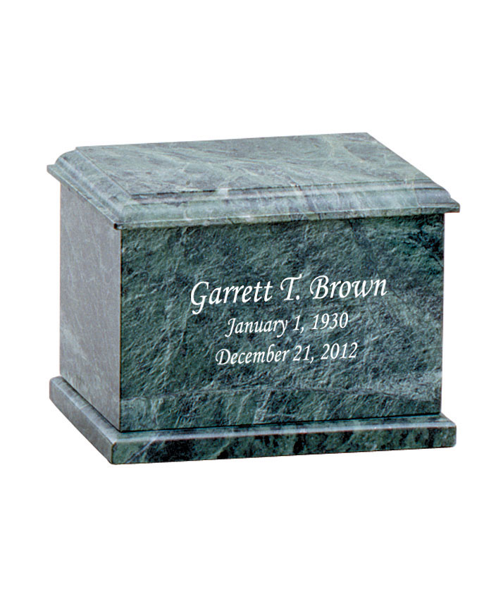 The photo on the urn shows names and dates with several more characters than it is allowing??
